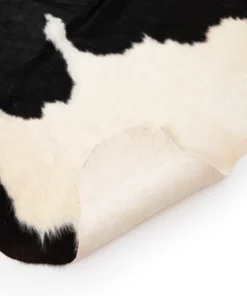 Four Hands Cardin Cowhide Rug Black And White New Arrivals 13 Four Hands Cardin Cowhide Rug Black And White New Arrivals