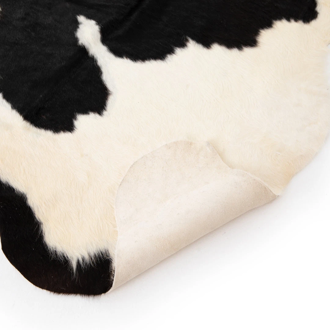 Four Hands Cardin Cowhide Rug Black And White New Arrivals 6 Four Hands Cardin Cowhide Rug Black And White New Arrivals