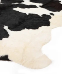 Four Hands Cardin Cowhide Rug Black And White New Arrivals 12 Four Hands Cardin Cowhide Rug Black And White New Arrivals