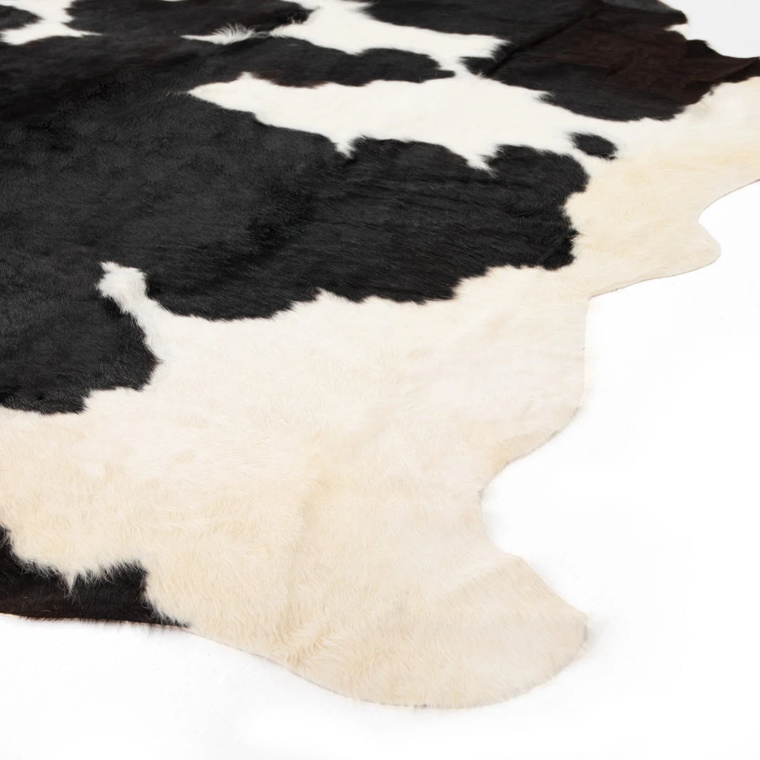 Four Hands Cardin Cowhide Rug Black And White New Arrivals 5 Four Hands Cardin Cowhide Rug Black And White New Arrivals