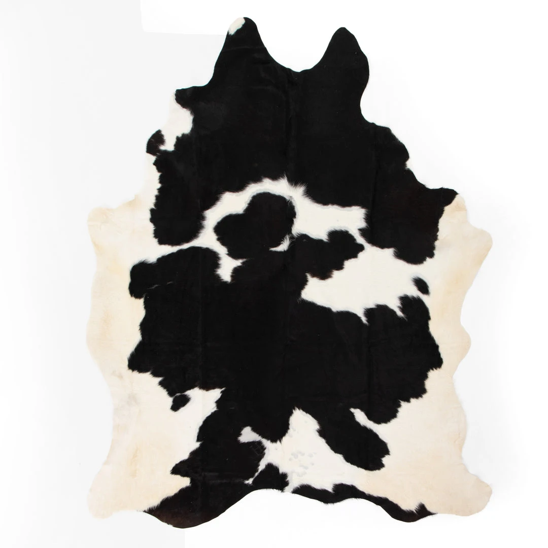 Four Hands Cardin Cowhide Rug Black And White New Arrivals 1 Four Hands Cardin Cowhide Rug Black And White New Arrivals